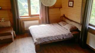 Гостевой дом Kozichky Guest House Татаров Номер с кроватью размера «king-size» и видом на горы-1